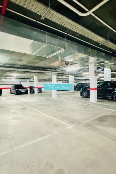 Underground parking for a 3-bedroom apartment in Calpe with multiple parking spaces.