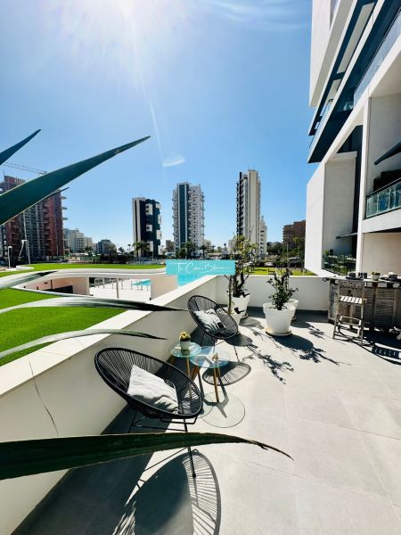 Balcony of a 3-bedroom apartment in Calpe with a view of the city and a modern terrace.