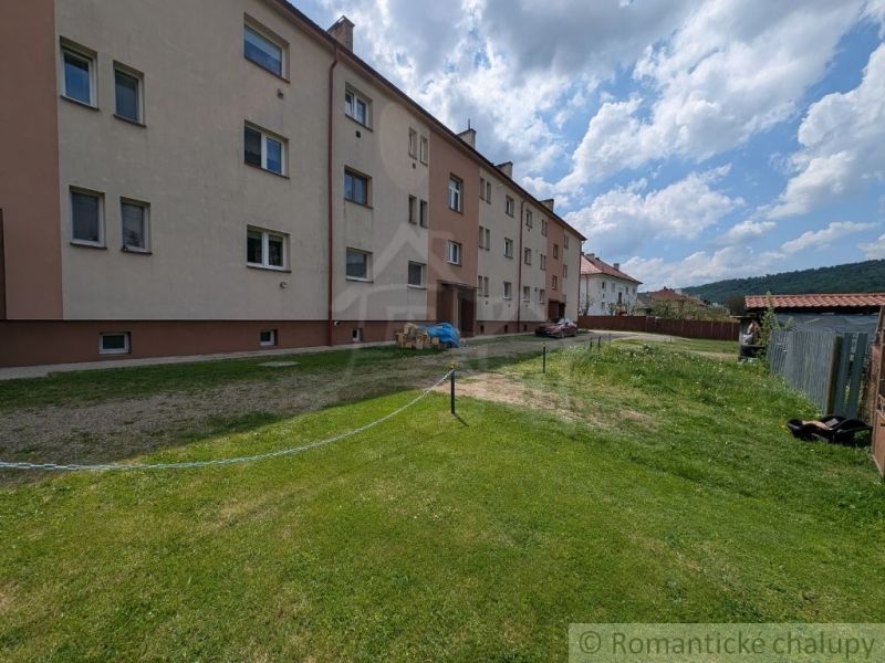 Apartment building in Medzilaborce with a grassy plot near a 2-room apartment.