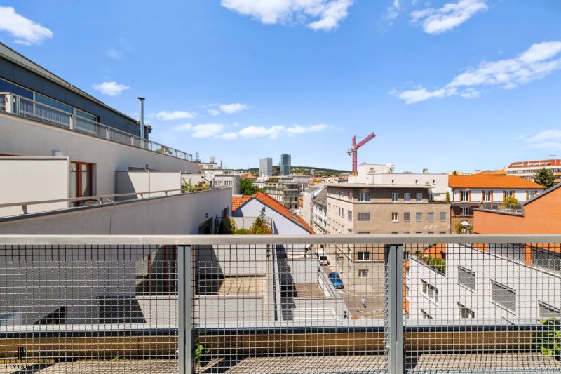 View from the terrace of a 4-room apartment in Bratislava on Dunajská Street with a panorama of the city.