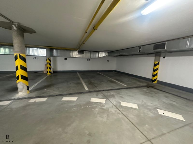 Underground parking spaces in a 4-room apartment on Dunajská Street in Bratislava.