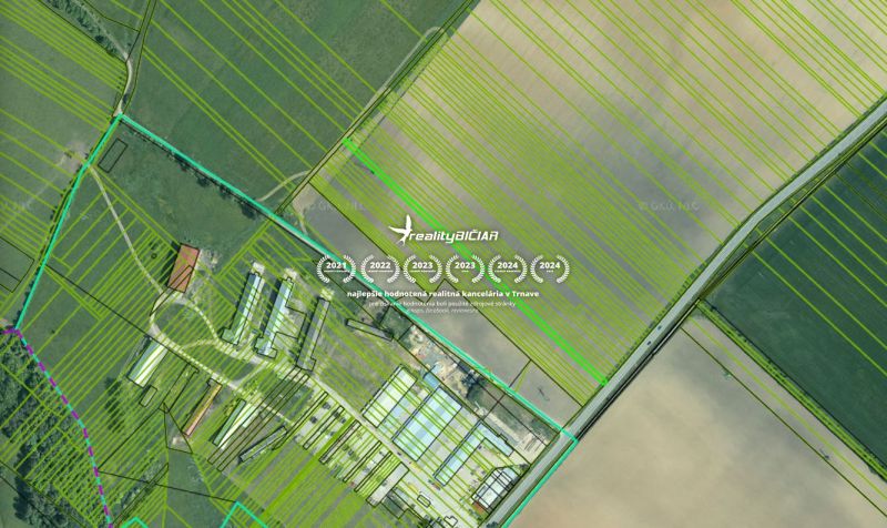 Aerial view of agricultural and forest land in Smolenice on Továrenská Street.