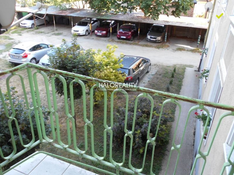 View from the balcony of the parking lot and greenery in a 3-room apartment in Trnava.