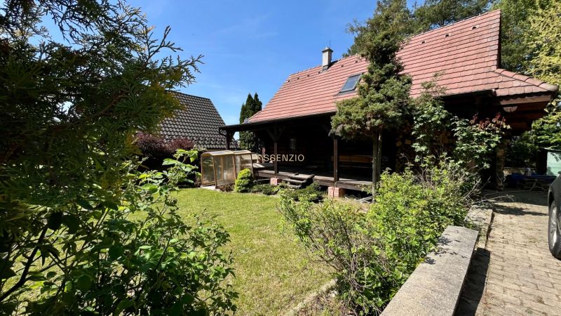 A family house at Devínske Jazero in Bratislava with a garden and a greenhouse.