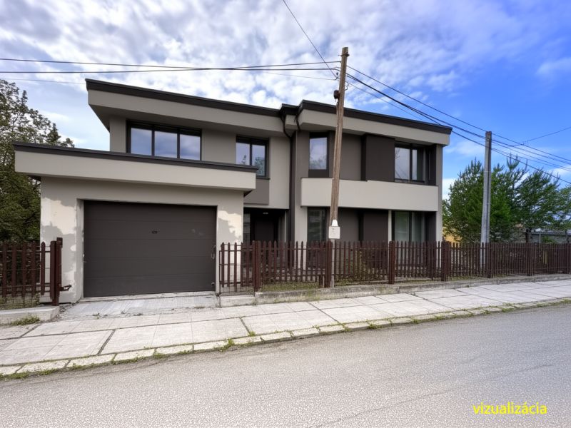 Two-story house with a garage and a fence in Lipany for Land - living.