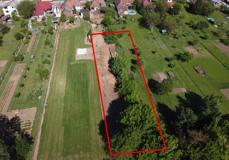 Aerial view of the gardens in Hruboňovo with a plot marked by a red line.