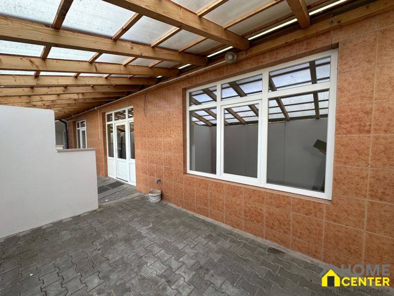 A terrace with a wooden decor roof in a 3-room apartment on Odborárov in Komárno.