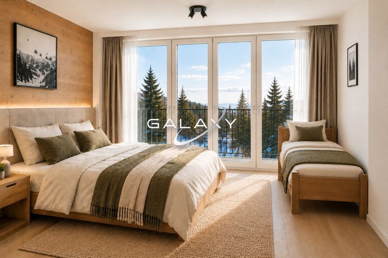 Bright interior of a holiday apartment with wood-decor flooring and a view of nature.