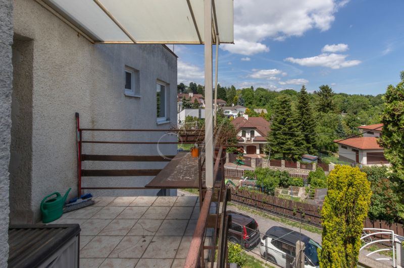 A balcony with a view of the green district in Bratislava - Nové Mesto, Na spojke.