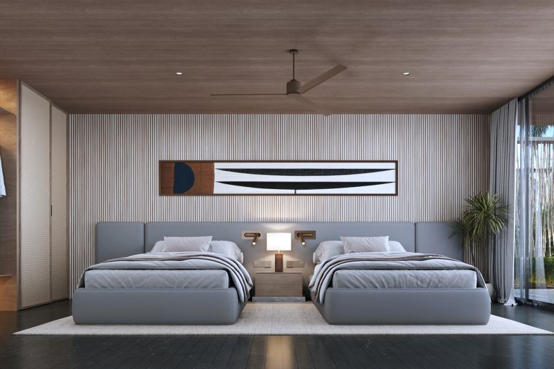 Double room in a villa with a wood-patterned floor and a decorative painting.