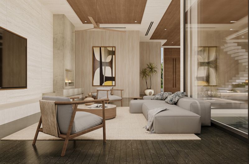 Living room in a villa with a comfortable sofa, fireplace, and floor with a wooden decor.