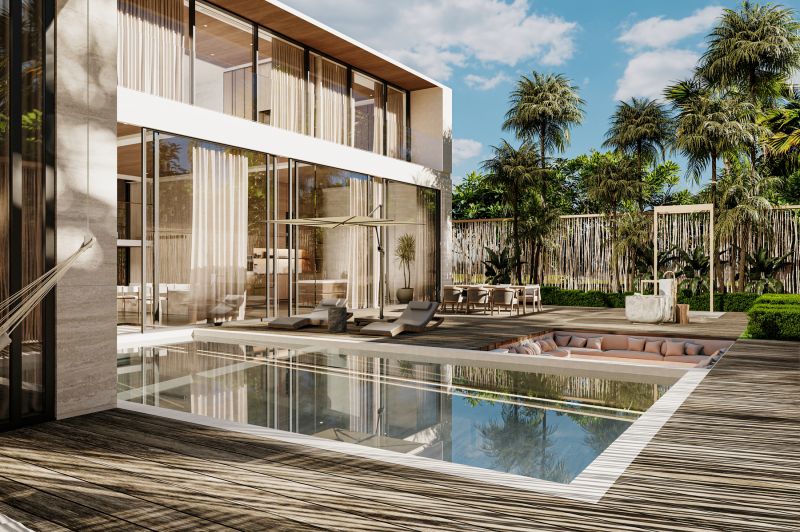 In Nungwi, there is a villa with a pool, sunbeds, and a terrace surrounded by palm trees.