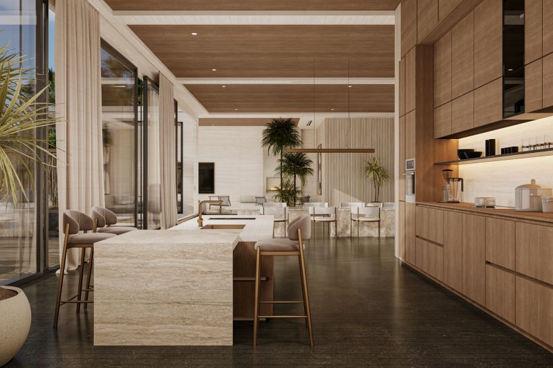 A spacious kitchen and dining room with stylish furniture and wood-patterned flooring in the villa.