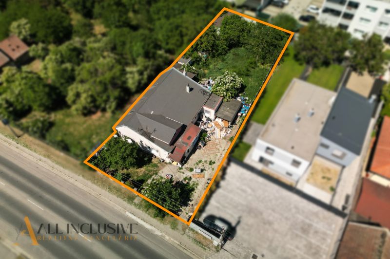 In Dunajská Lužná, there is a plot for residential use with a house and a garden.