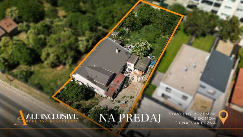 Aerial view of a plot with a house in Dunajská Lužná intended for living.