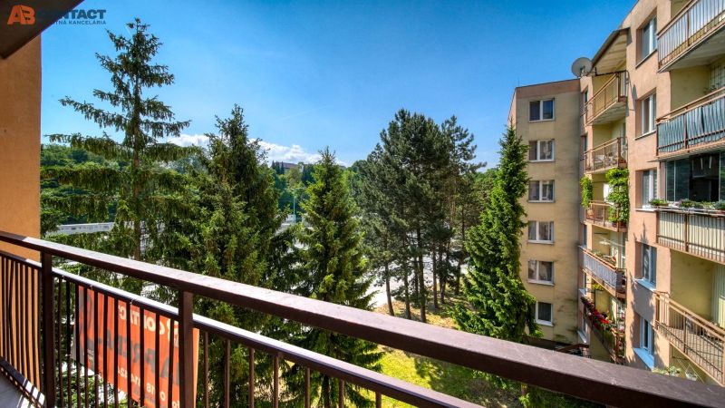 Balcony of a 4-room apartment on Viestova Street in Myjava with a view of greenery.