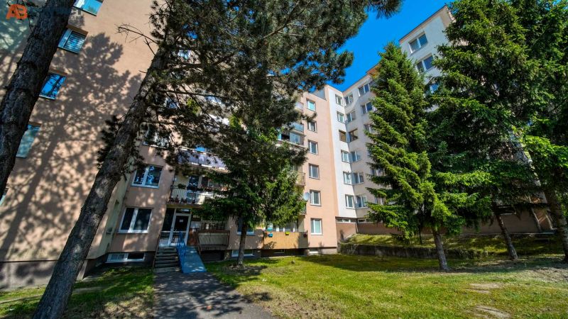 An apartment building surrounded by trees on Viestova Street in Myjava, offering a 4-room apartment.