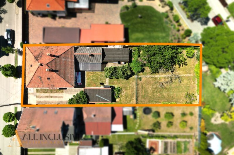 Aerial view of a family house in Dunajská Streda with a large yard.