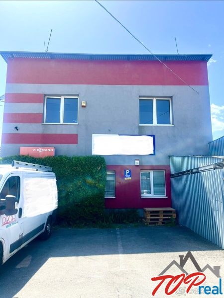 Commercial premises in Košice - Sever district with a van parked in front of the building.