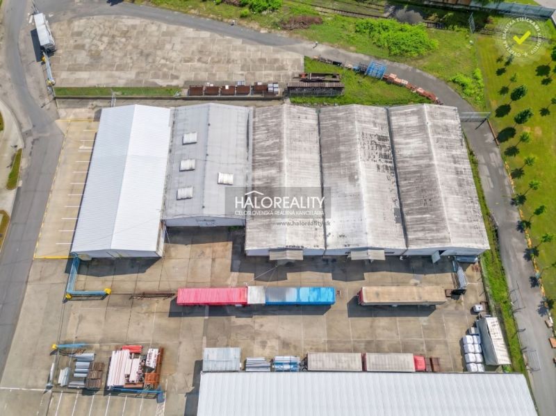 Production facilities in Považská Bystrica, storage buildings, industrial zone, aerial view.