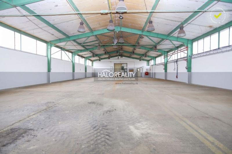 Production facilities with high ceilings and steel construction.