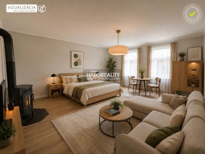 Interior of a family house with a fireplace, bed, and wooden decor flooring.
