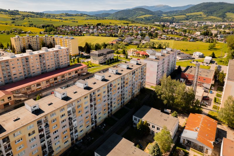 A view of the apartment complex on 9th May Street in the town of Brezno surrounded by nature.
