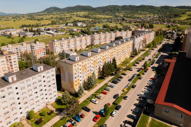 A view of the housing estate with apartment buildings and greenery on 9th May Street in Brezno.