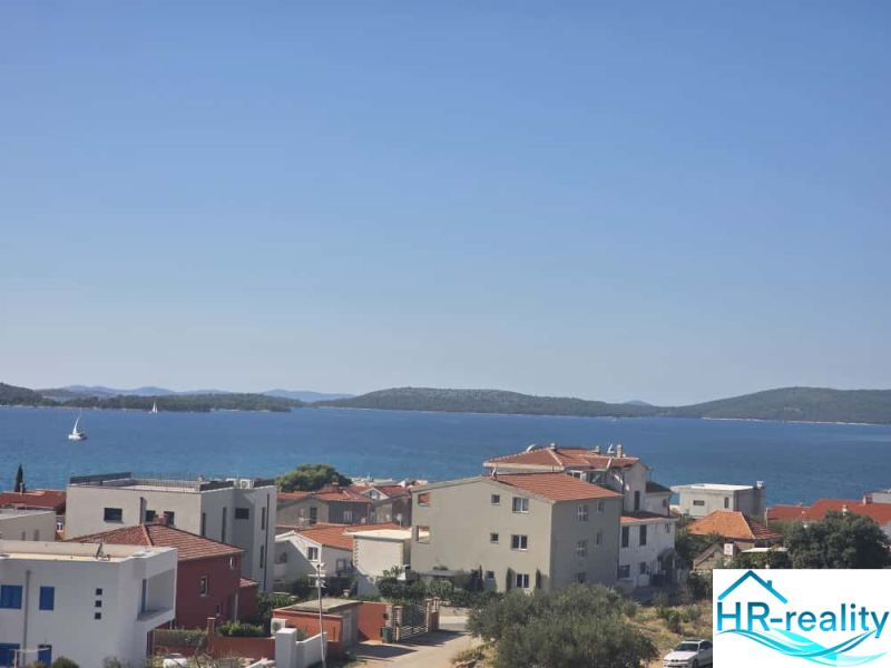 A view of the sea and houses in Žaborić from a 2-room apartment.