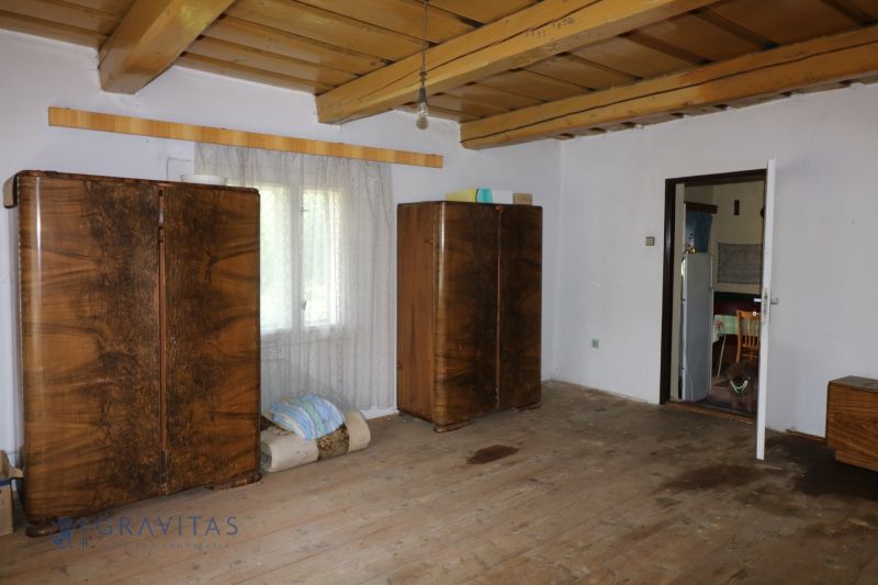 Interior with wooden cabinets and flooring with wood decor in Home Construction.