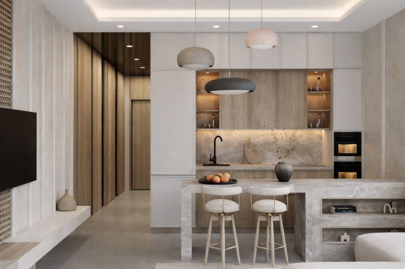 Kitchen in a one-room apartment with a concrete floor and bright lighting.