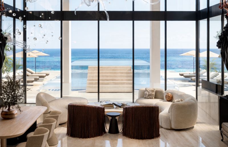 Luxury living space in a 5 or more bedroom apartment with an ocean view.