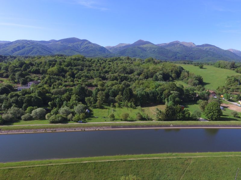 Land near Turany on Hlboká Road suitable for residential plots, with a view of the forests.