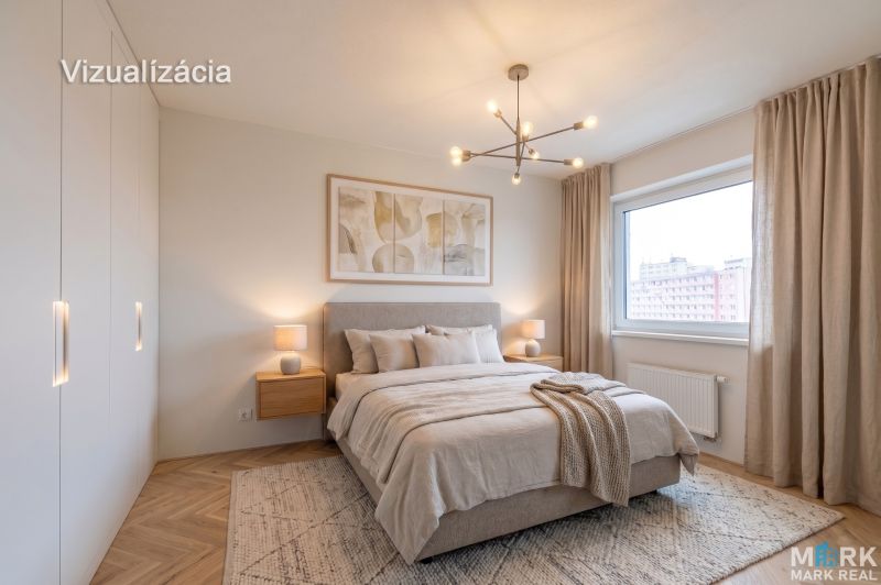 Bedroom in a two-room apartment, bed with a blanket, wooden decor flooring, large window.