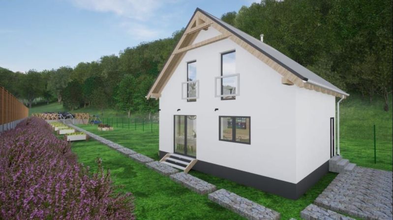 A family house with a simple design surrounded by a garden and flower beds in Kostiviarska, Banská Bystrica.