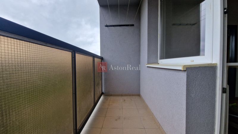 Balcony of a 2-room apartment with a tiled floor and railing in the Karol Kuzmány decor, Kežmarok.