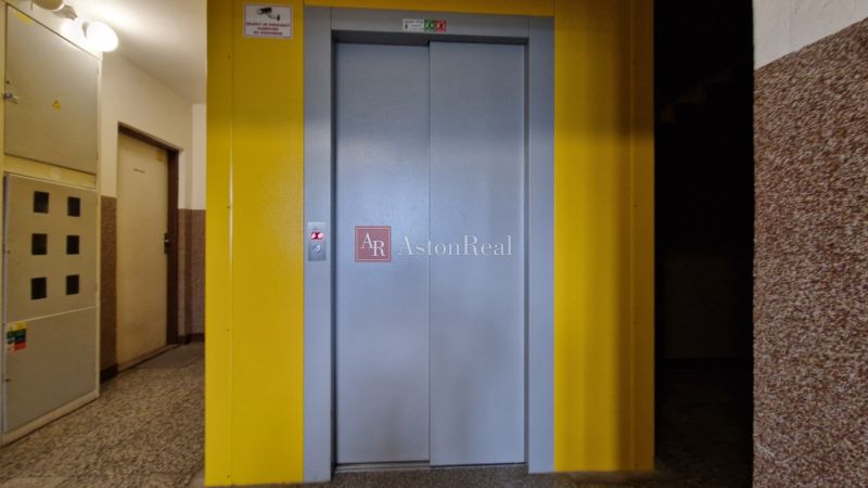 Hallway in a panel building with an elevator on Karola Kuzmányho Street in Kežmarok.