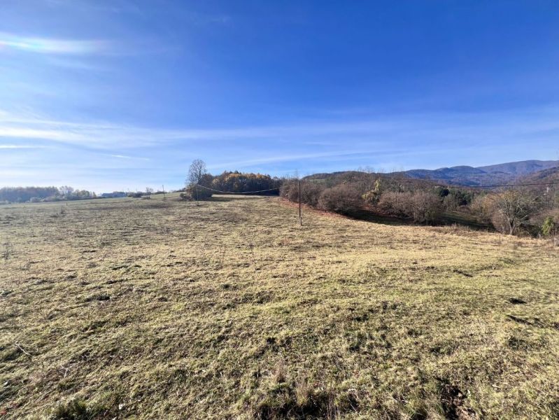 Landscape with fields under a blue sky on Pršianska Road in Banská Bystrica. Land - residential.