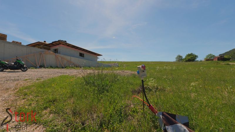 Building and green field in the village of Lietavská Svinná-Babkov suitable for residential plots.