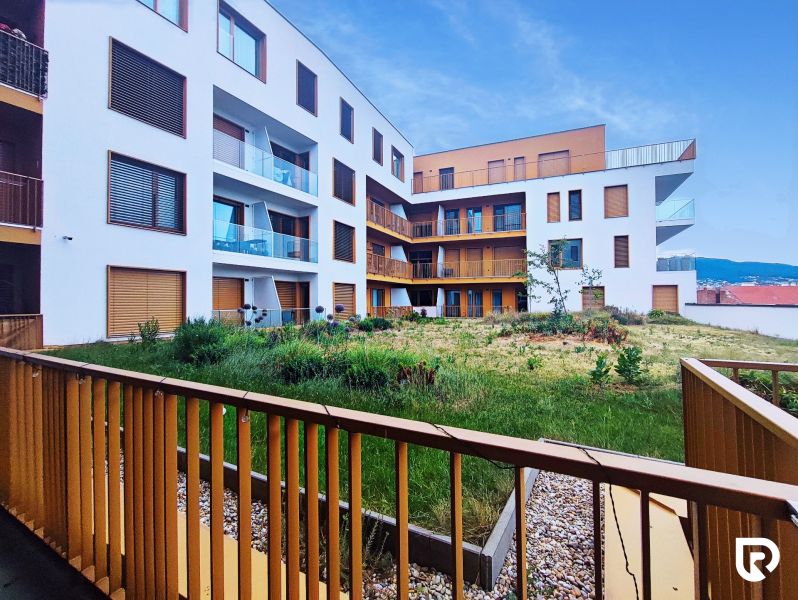 Apartment building on Piaristická Street in Nitra with an inner green courtyard.
