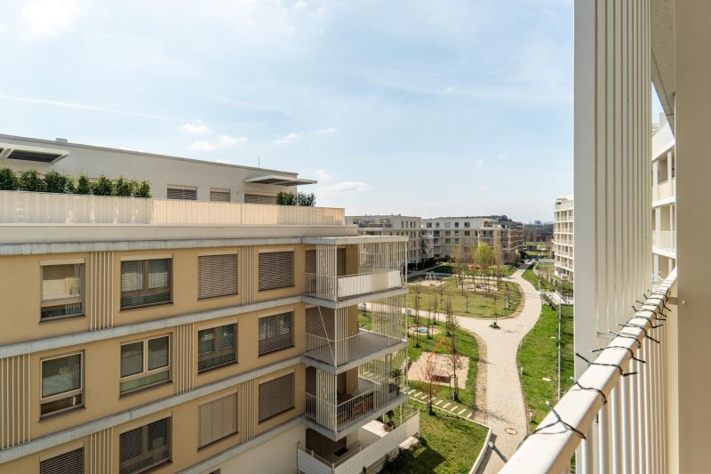 Balconies and greenery between apartment buildings in Bratislava - Ružinov.