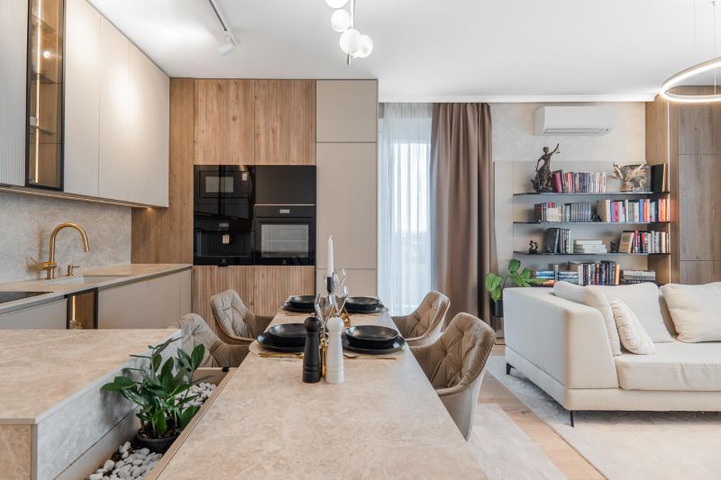 Kitchen and living room in a 3-room apartment with a wooden decor floor and a dining table.