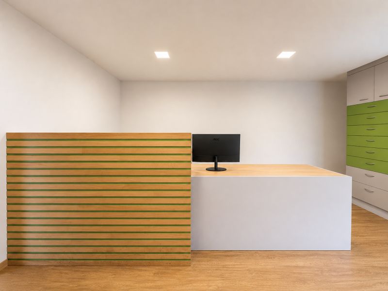 Reception in manufacturing premises with a counter and a cabinet, floor with wood decor.