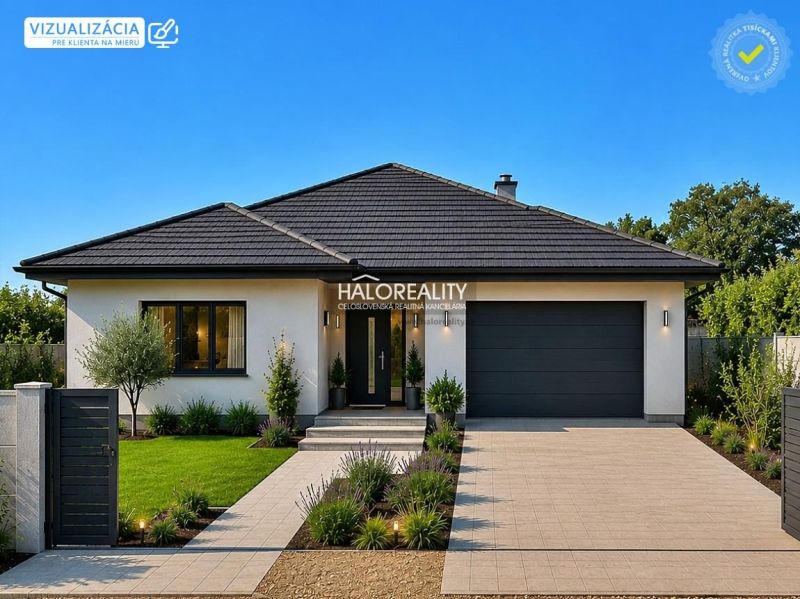 A family house with a garden in Jur nad Hronom, suitable for residential plots.