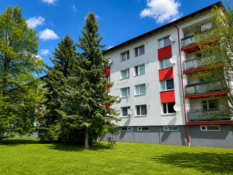 An apartment building surrounded by trees on Za Nožiarňou Street in Slovenská Ľupča.