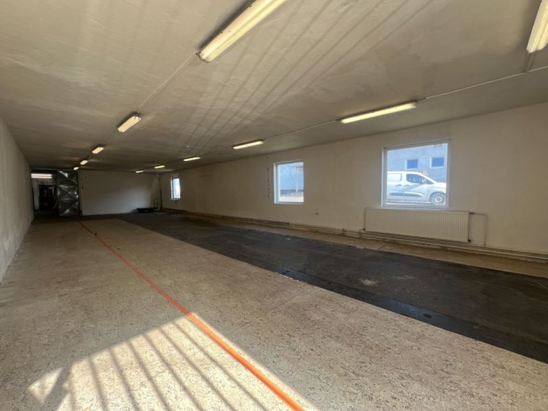 Hall with lighting, flooring, windows, and doors in warehouses and halls.