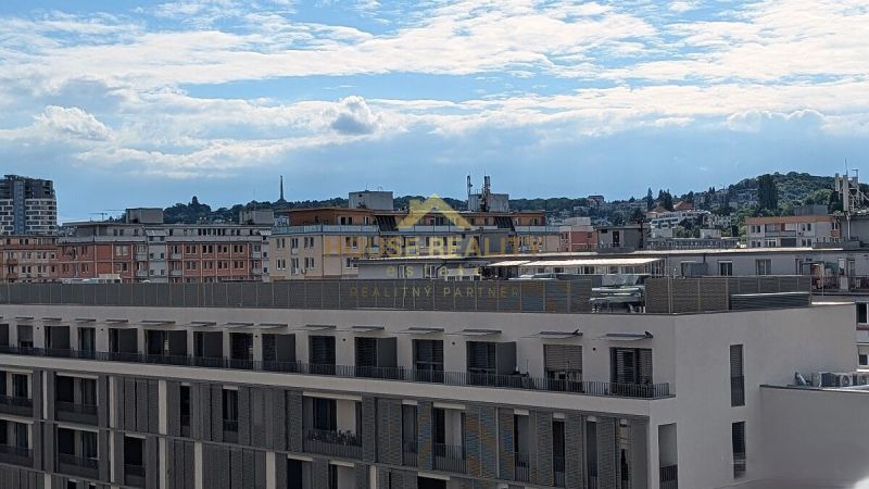 A view of the rooftops of buildings in Bratislava - Nové Mesto on Račianska Street.