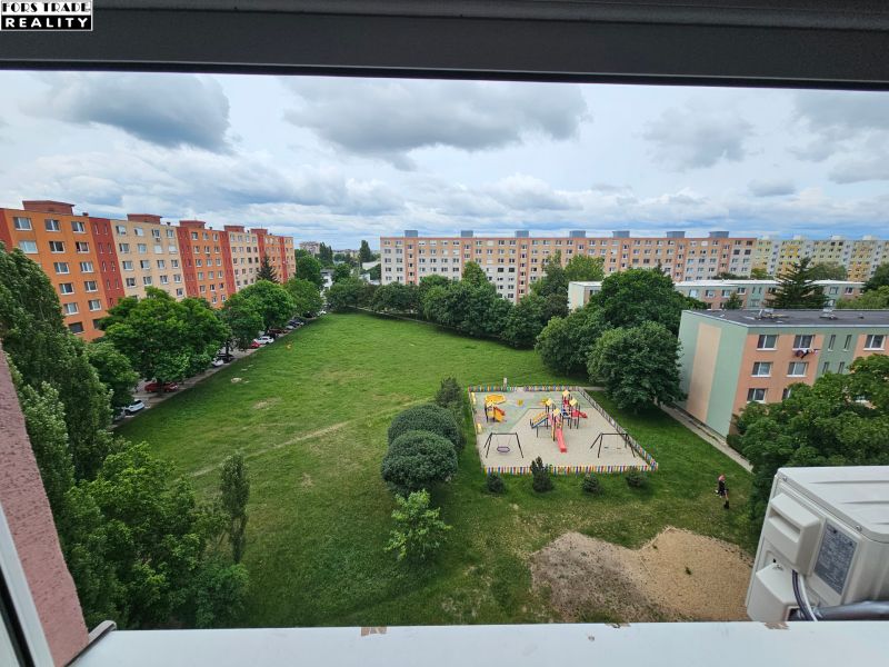 The view from the property on Nešporova Street in Šaľa with a playground and a housing estate.