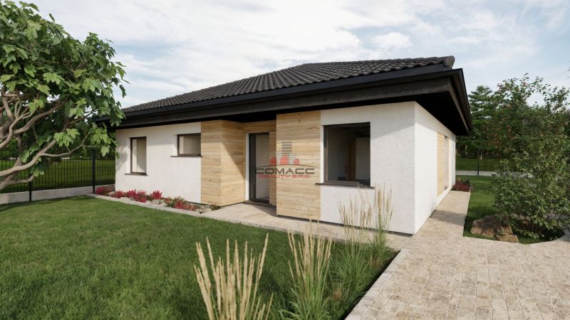 Family house on Kostolná in Drahová with a white facade and wooden decor.