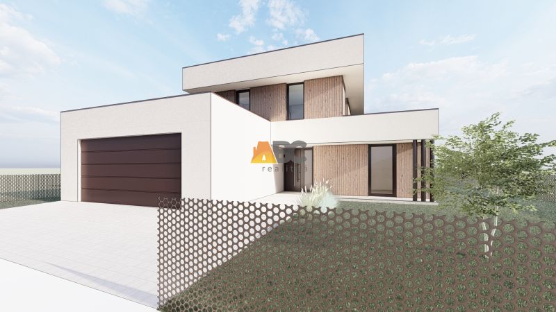 Family house in Sliač, residential plots with wood decor and a garage.